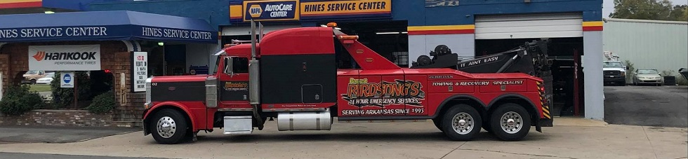 Red Flat Bed Tow Truck in Conway, AR